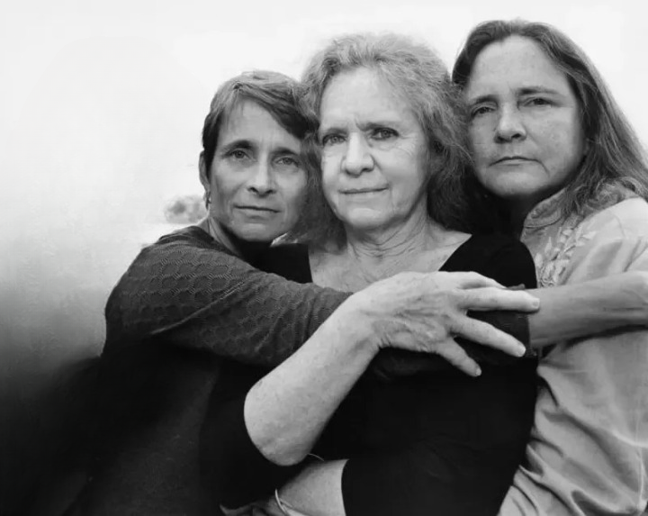 Identical triplets take the same birthday picture for 33 years