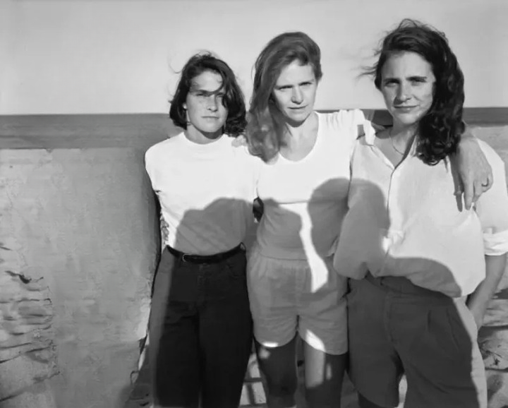 Identical triplets take the same birthday picture for 33 years
