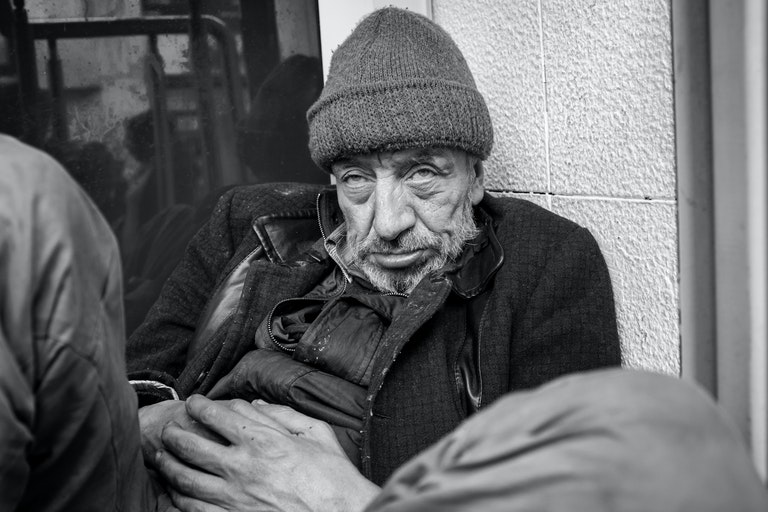 Homeless man reveals his true identity and shocks waitress who brings him food