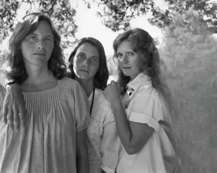 Identical triplets take the same birthday picture for 33 years