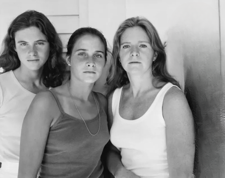 Identical triplets take the same birthday picture for 33 years