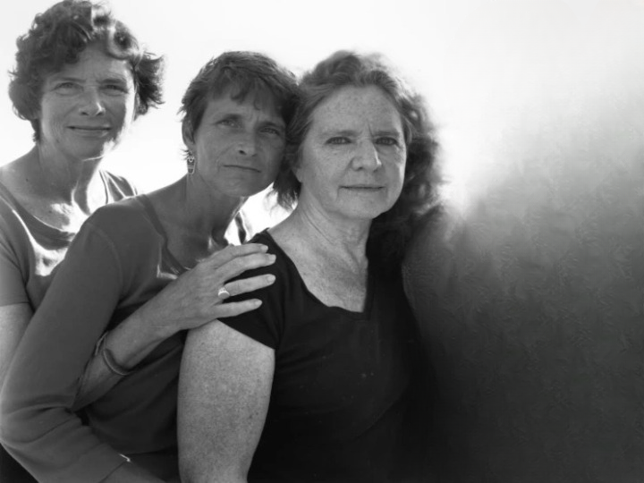 Identical triplets take the same birthday picture for 33 years