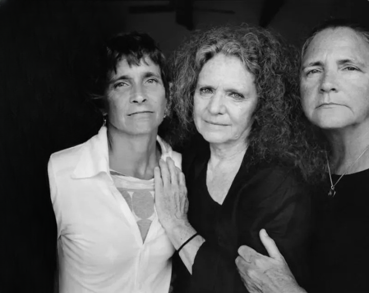 Identical triplets take the same birthday picture for 33 years