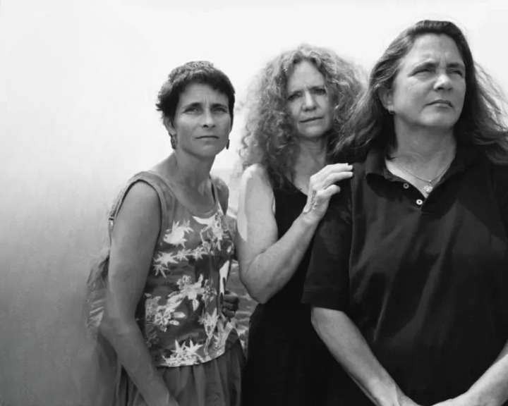 Identical triplets take the same birthday picture for 33 years