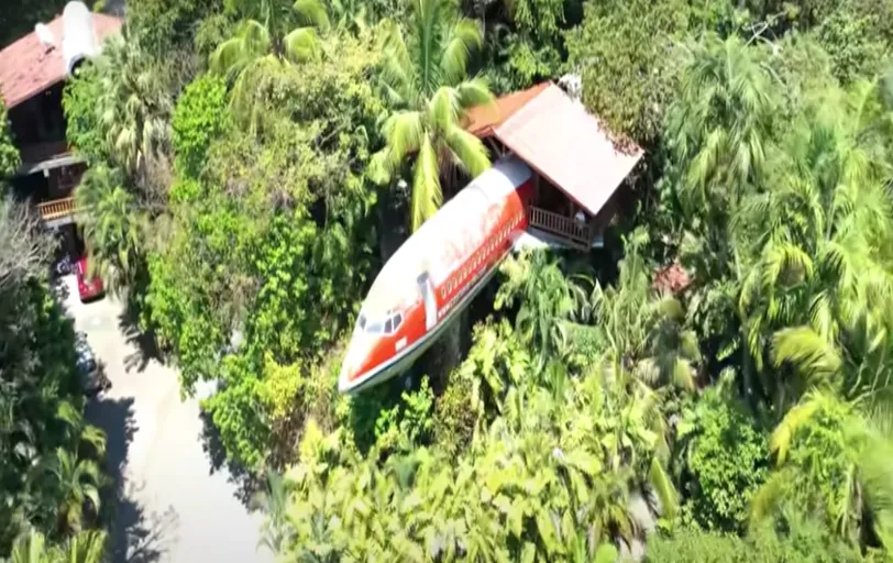 An airplane in the middle of the jungle has been converted into a beautiful holiday home