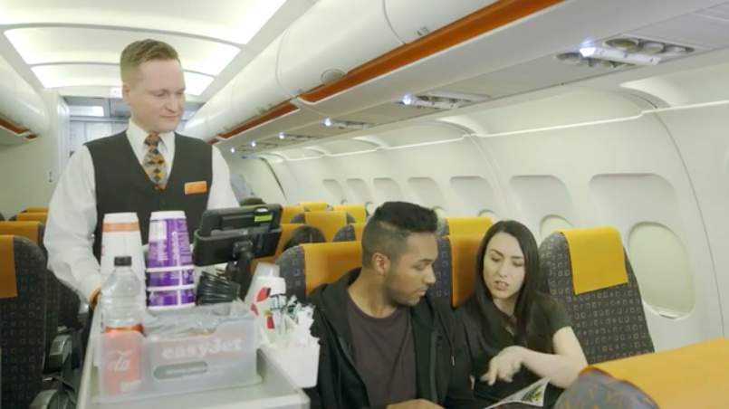 Ever wonder about those strange hand signals cabin crew use on planes? This is what they mean!
