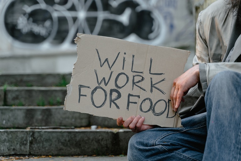 Homeless man reveals his true identity and shocks waitress who brings him food