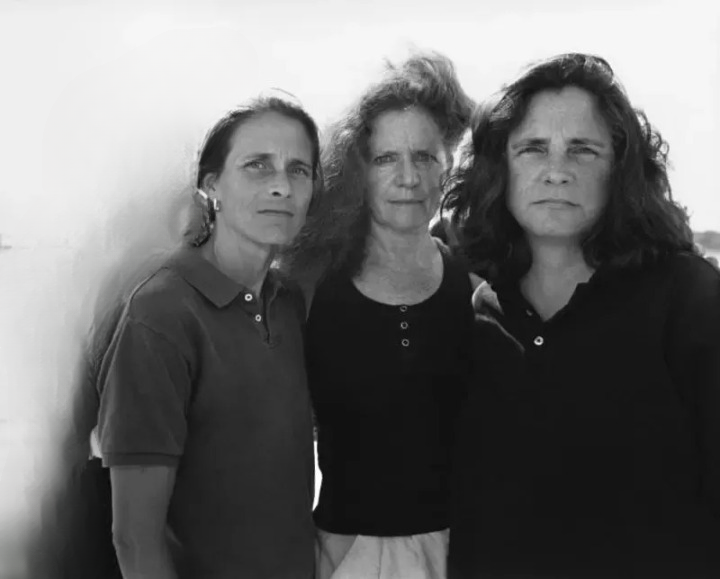 Identical triplets take the same birthday picture for 33 years