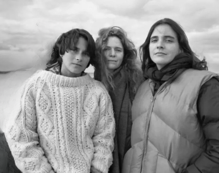 Identical triplets take the same birthday picture for 33 years