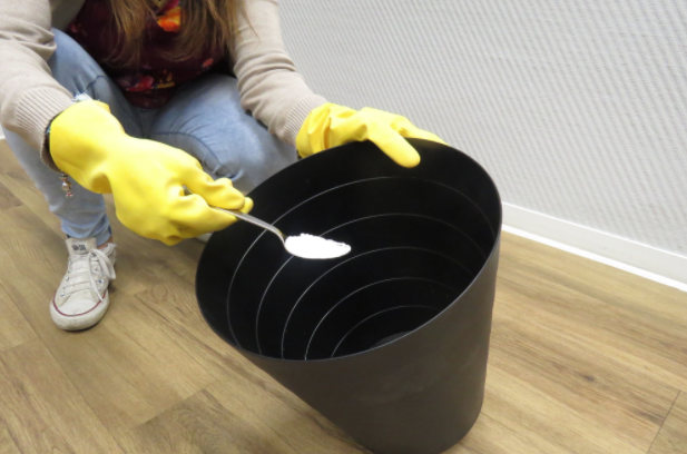 This is why you should always put baking soda at the bottom of your trash can!