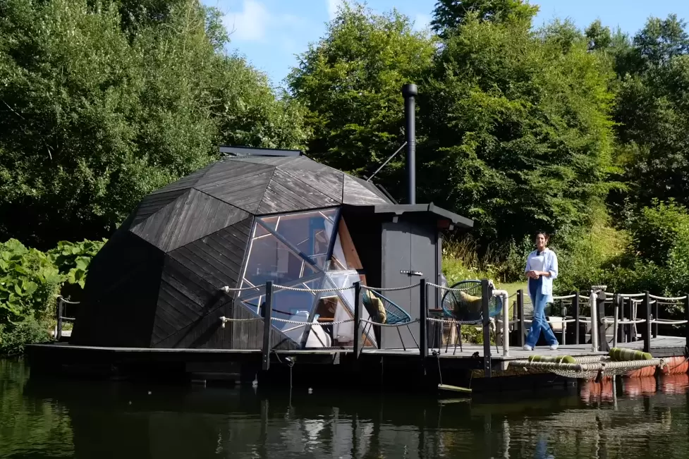 This 23-year-old lady is living in a floating house of only 180 sq. ft., but when you see the inside you’ll want to live there!